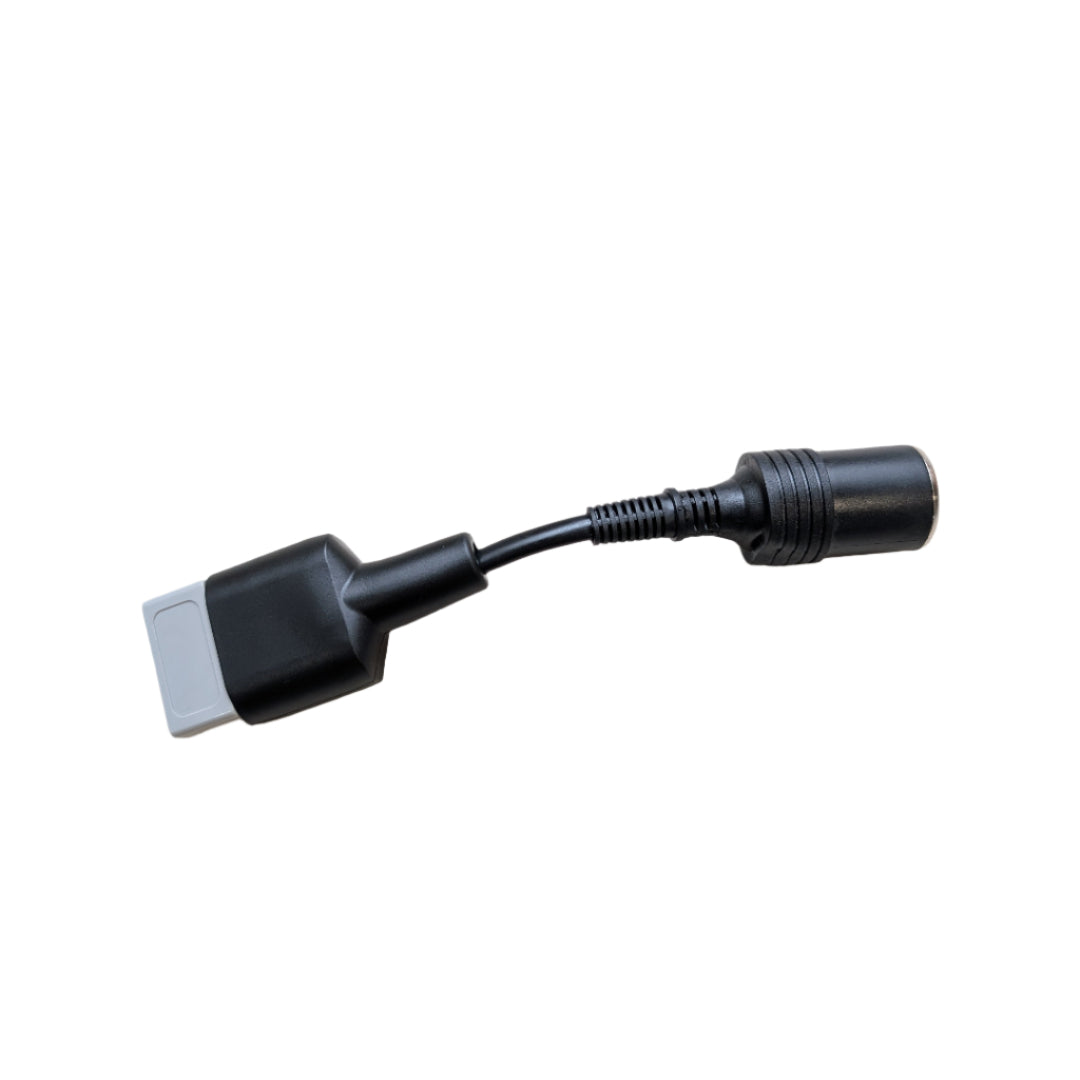 Black electronic connector on a light beige surface