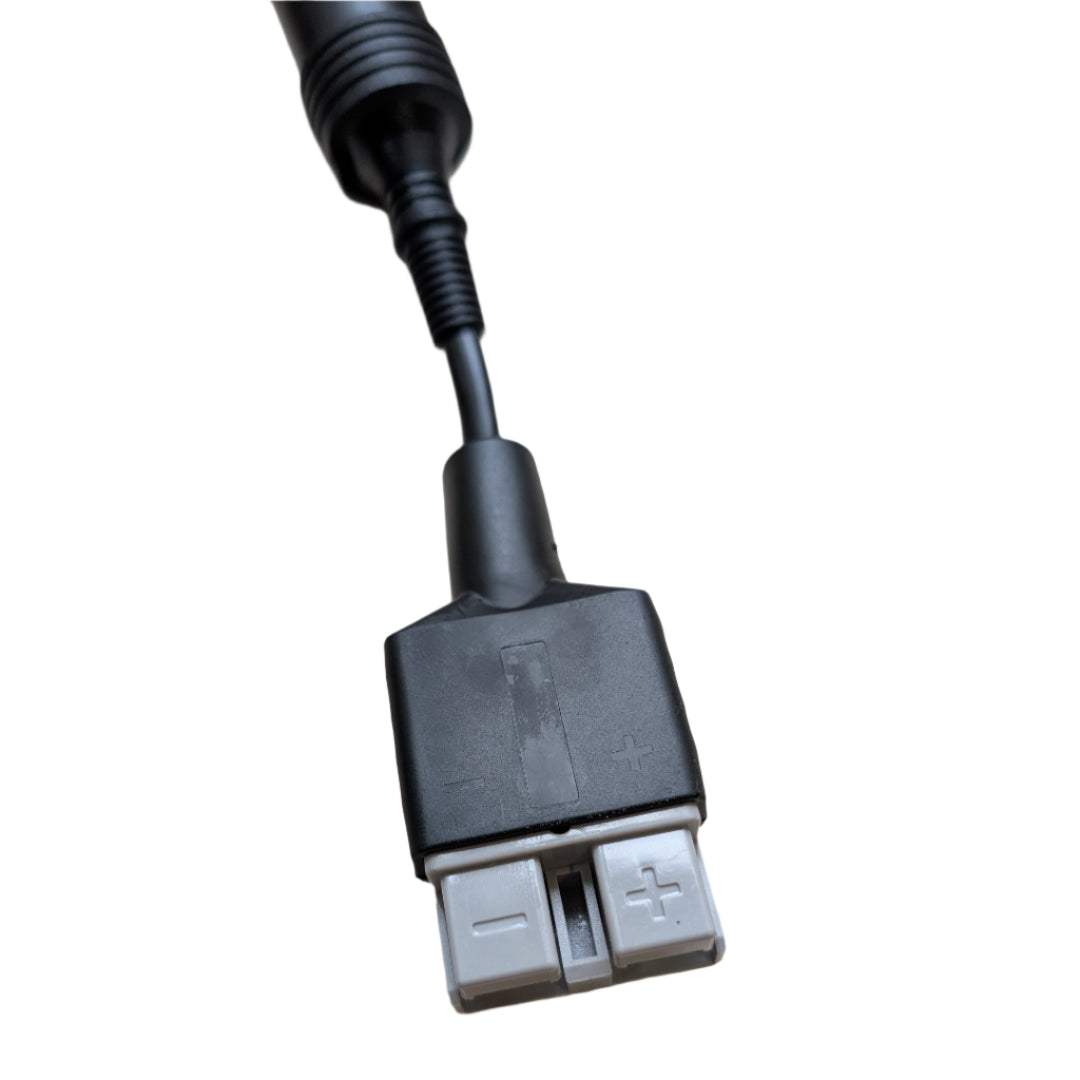 USB cable with connectors on a beige surface