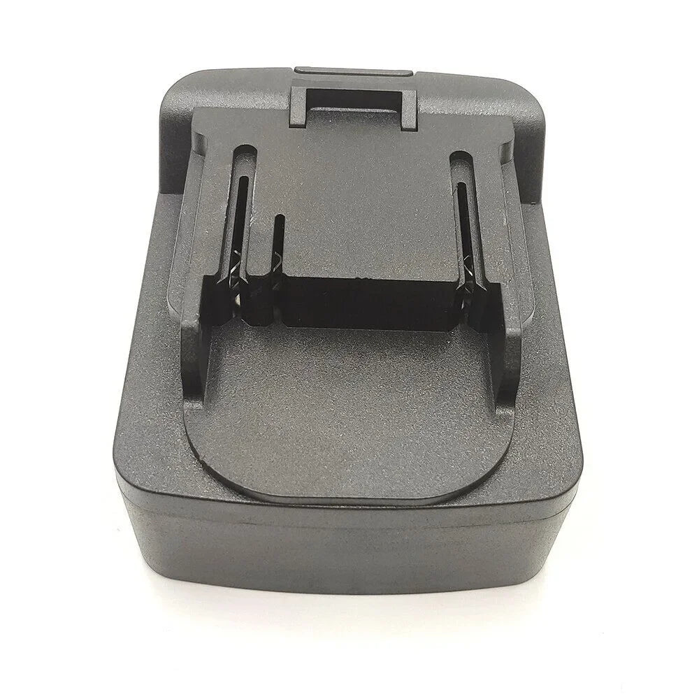 Black electronic device charging dock on a white background